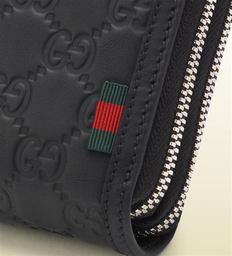 gucci zip wallet uk.